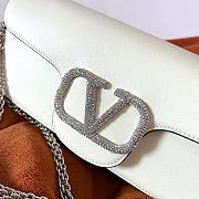 Valentino Garavani Mini Locò Crystal-Embellished Shoulder Bag in White - 4
