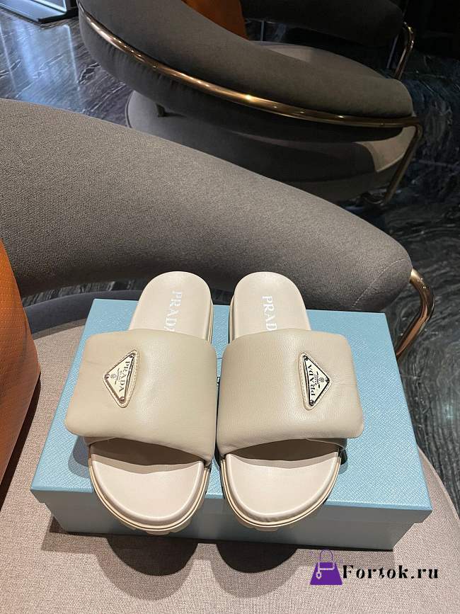 Prada Padded Napa Leather Slides in Beige - 1