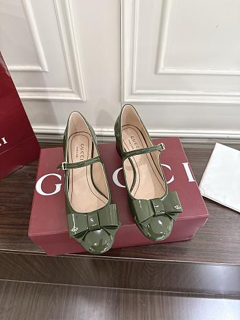 Fortok Gucci slingback pumps in a green patent leather