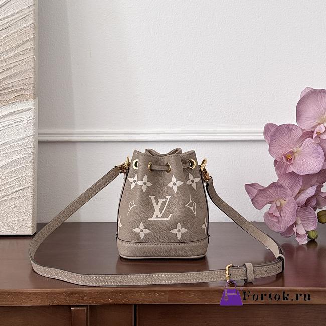 Fortok Louis Vuitton Nano Noé bag in bicolor monogram empreinte leather in the Tourterelle Gray/Crème 13x16x10cm - 1
