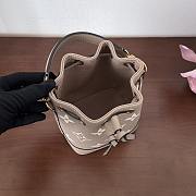 Fortok Louis Vuitton Nano Noé bag in bicolor monogram empreinte leather in the Tourterelle Gray/Crème 13x16x10cm - 6