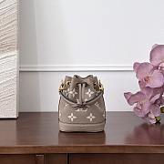 Fortok Louis Vuitton Nano Noé bag in bicolor monogram empreinte leather in the Tourterelle Gray/Crème 13x16x10cm - 5