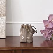 Fortok Louis Vuitton Nano Noé bag in bicolor monogram empreinte leather in the Tourterelle Gray/Crème 13x16x10cm - 2