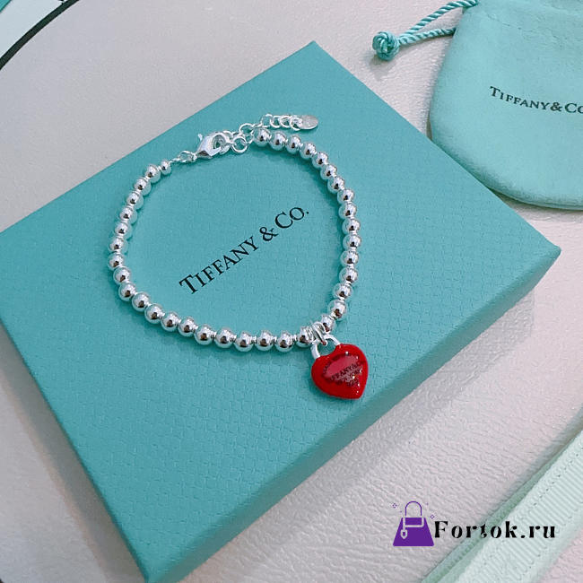 Fortok Tiffany & Co. Return to Tiffany Heart Tag Toggle Bracelet in silver with a red heart tag  - 1