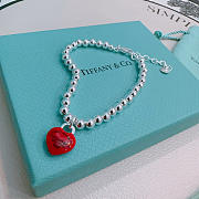 Fortok Tiffany & Co. Return to Tiffany Heart Tag Toggle Bracelet in silver with a red heart tag  - 2