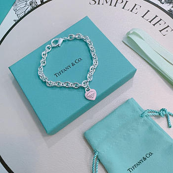 Fortok Tiffany & Co. Return to Tiffany Heart Tag Toggle Necklace in silver with a Pink heart tag 